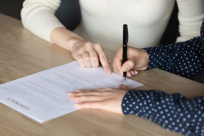Close,Up,Indian,Woman,Client,Signing,Contract,,Making,Deal,With